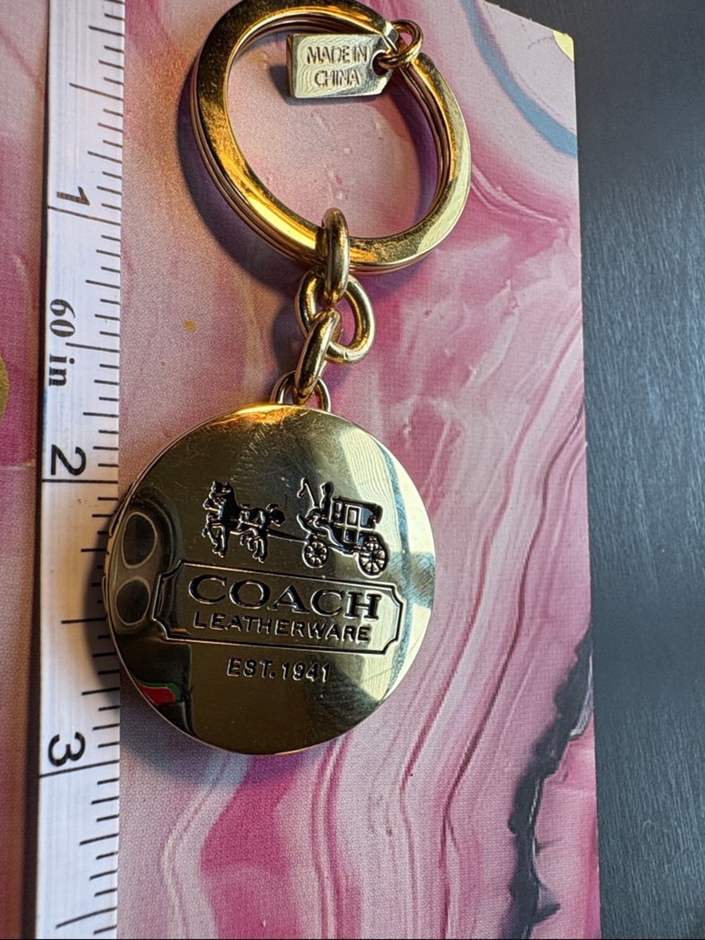 Coach Gold-Tone Round Leatherware Locket Keychain